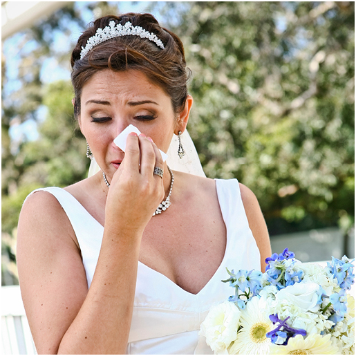Bride crying at wedding allergies